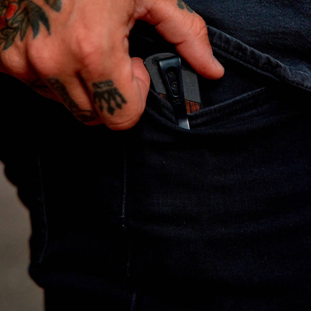 Buck 110 Folding Hunter Crossbar Knife with Pocket Clip in Use