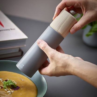 Peugeot Boreal Rock Grey 8" Classic Pepper Mill in Use with Soup