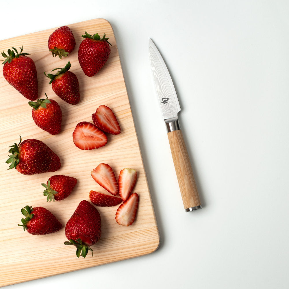 Shun Classic Blonde 3.5" Paring Knife in Use Slicing Berries