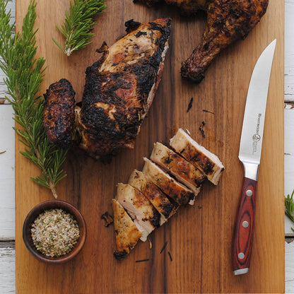 Messermeister Avanta Forged 4-Piece Steak Knife Set in Use with BBQ Chicken