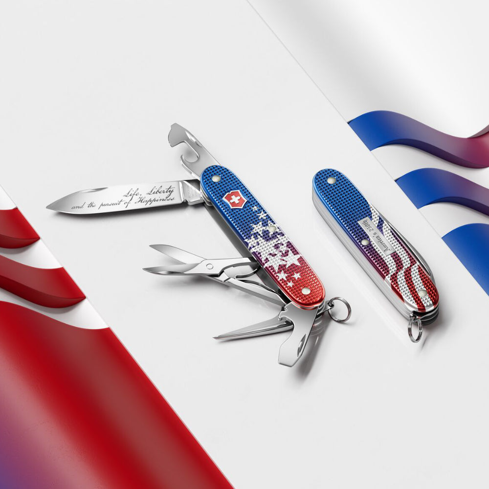 Victorinox America's 250th Anniversary Pioneer X Alox 2026 Limited Edition Swiss Army Knife with Flag Background