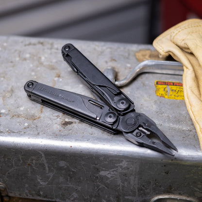 Leatherman Surge Black Oxide Pliers Multi-Tool in Use for Home DIY