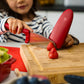 Twinny Kid's Chef's Knife by Zwilling Slicing Strawberries with Finger Guard